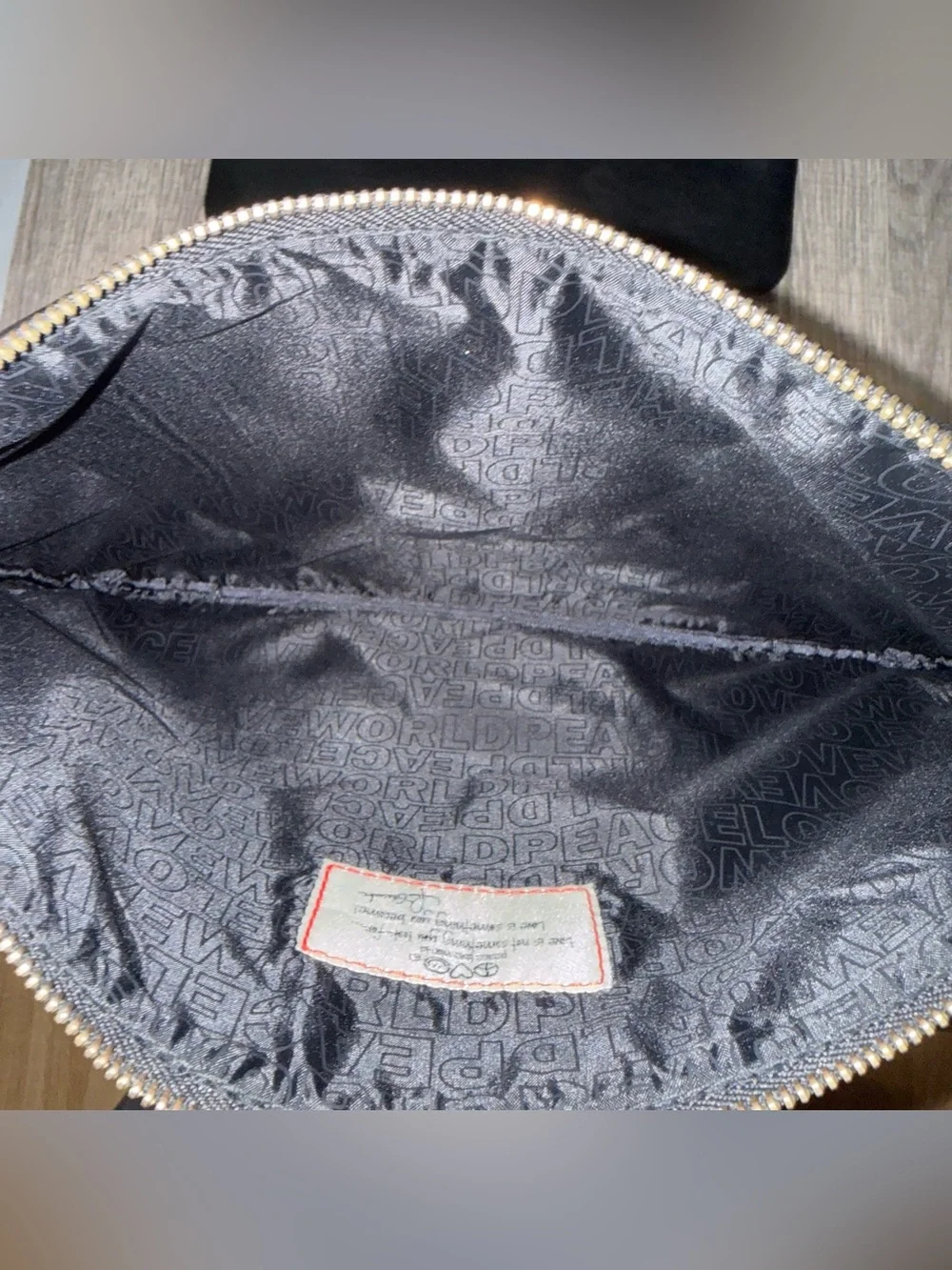 2 Peace Love World Black Embossed Leather Clutch Wristlets